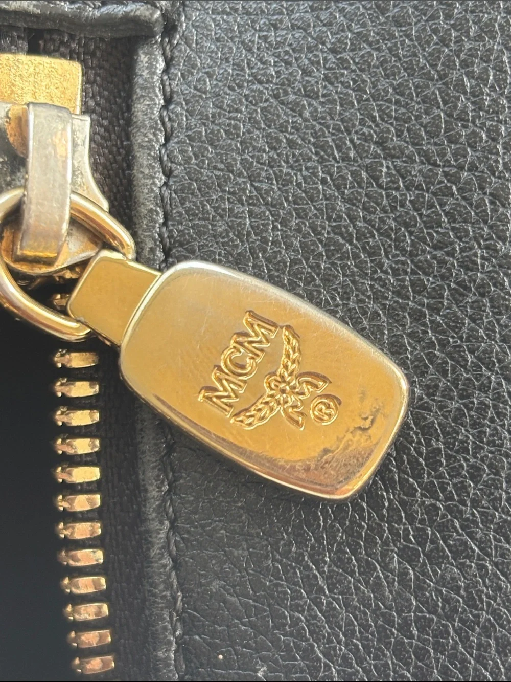 MCM Black Leather Satchel with Gold Hardware Accents